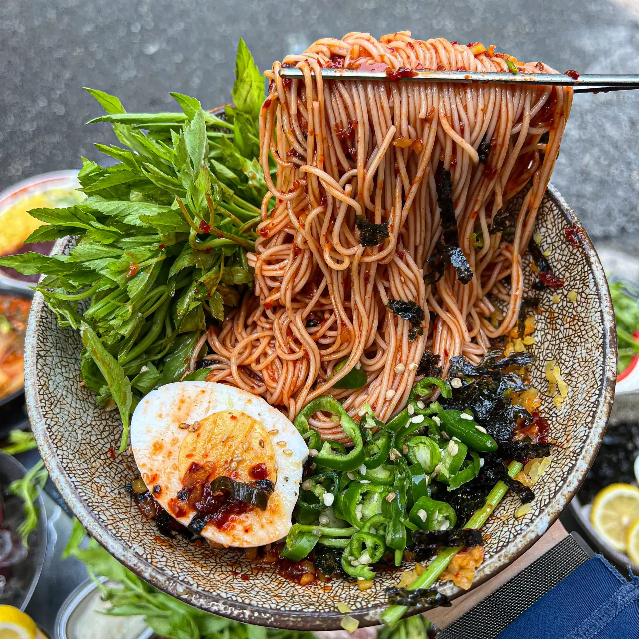 향긋한 미나리 비빔국수 — Kim Sukseong Hongdae, aged-meat Korean BBQ at a Hongdae restaurant in Seoul (홍대 맛집)